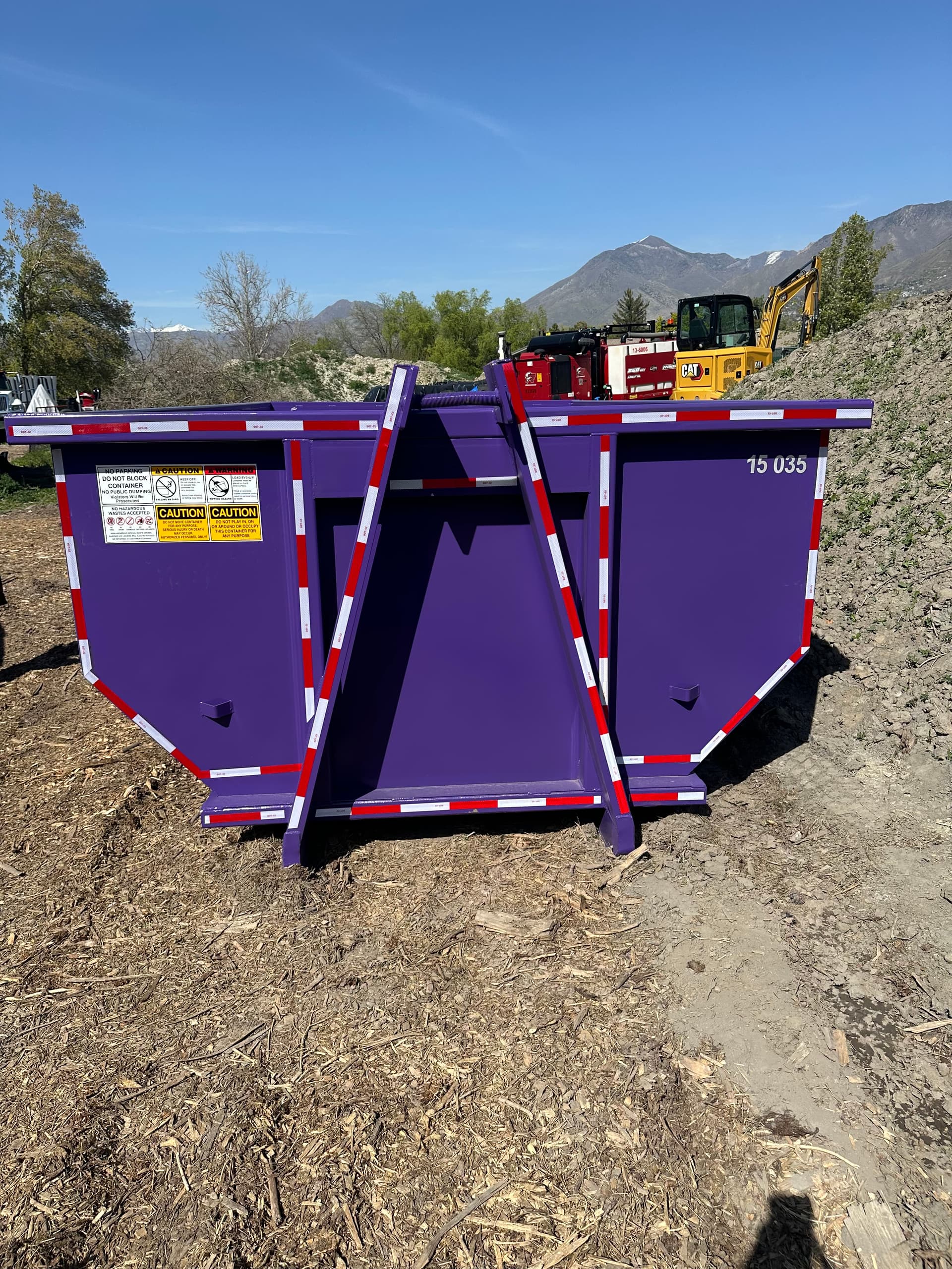 TNT Dumpsters professional team providing reliable waste management services